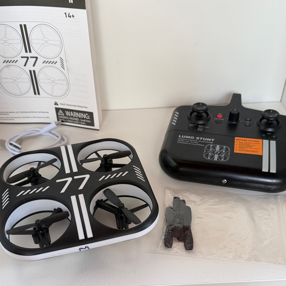 Sharper Image 77 Lumo Stunt Drone - Black and White - Kids 14+ - EUC - Remote